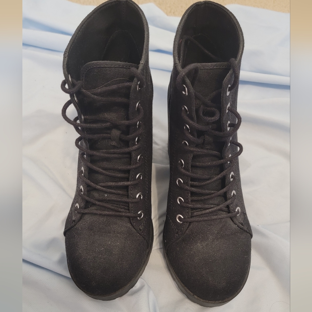 Black ankle boots with 3 in. Heel